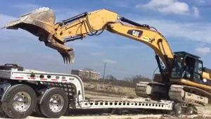 Murray Trailers | Pro with 336D Excavator Loaded over back